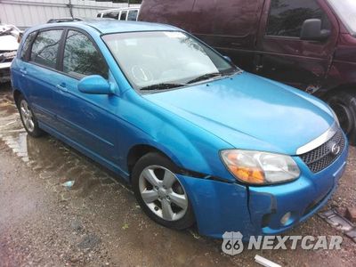 Czwarte zdjęcie samochodu z boku: 2007 KIA SPECTRA5 SX VIN:KNAFE161275004479 - miniatura