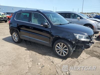 Czwarte zdjęcie samochodu z boku: 2017 VOLKSWAGEN TIGUAN WOLFSBURG VIN:WVGSV7AX4HW508717 - miniatura