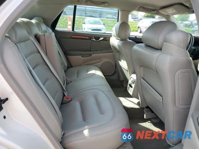 Zdjęcie 10 z 14 samochodu: 2003 CADILLAC DEVILLE VIN:1G6KD57Y13U210337 - miniatura