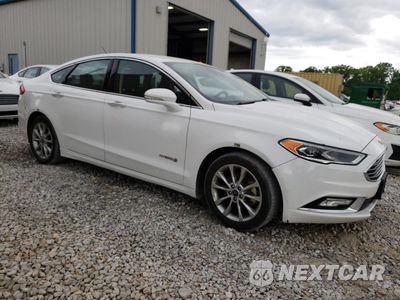 Czwarte zdjęcie samochodu z boku: 2017 FORD FUSION SE HYBRID VIN:3FA6P0LU0HR409489 - miniatura