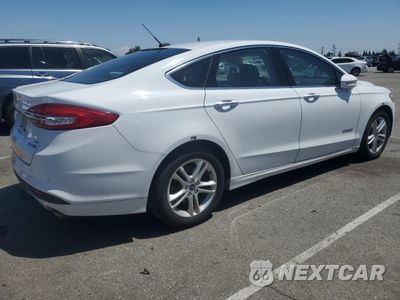 Trzecie zdjęcie samochodu z tyłu: 2018 FORD FUSION SE HYBRID VIN:3FA6P0LU9JR278634 - miniatura