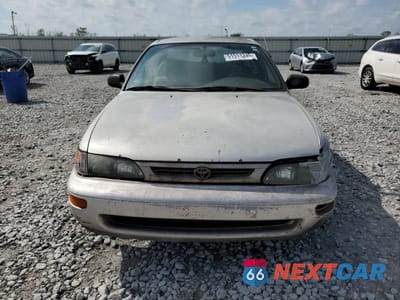 Piąte zdjęcie samochodu w środku: 1997 TOYOTA COROLLA DX VIN:1NXBA02EXVZ538005 - miniatura