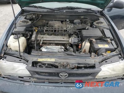 Zdjęcie 11 z 12 samochodu: 1997 TOYOTA COROLLA DX VIN:1NXBB02E8VZ519692 - miniatura
