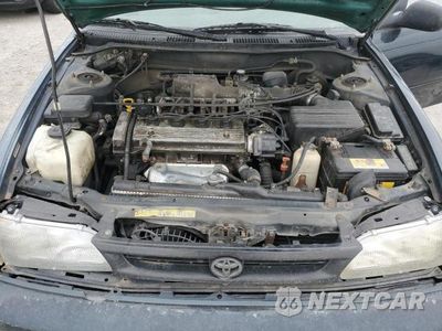Zdjęcie 11 z 12 samochodu: 1997 TOYOTA COROLLA DX VIN:1NXBB02E8VZ519692 - miniatura