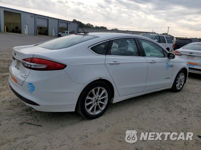 Trzecie zdjęcie samochodu z tyłu: 2017 FORD FUSION SE HYBRID VIN:3FA6P0LUXHR409127 - miniatura