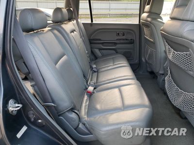 Zdjęcie 11 z 15 samochodu: 2004 HONDA PILOT EXL VIN:2HKYF18544H572012 - miniatura