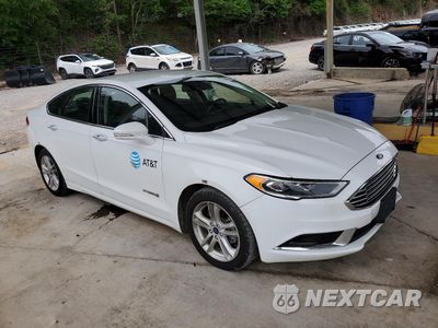 Czwarte zdjęcie samochodu z boku: 2018 FORD FUSION SE HYBRID VIN:3FA6P0LU1JR118621 - miniatura