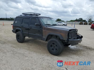 Czwarte zdjęcie samochodu z boku: 2000 JEEP CHEROKEE SPORT VIN:1J4FT48SXYL134212 - miniatura