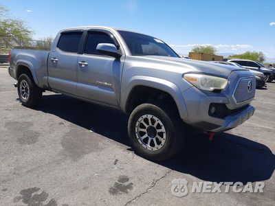 Czwarte zdjęcie samochodu z boku: 2016 TOYOTA TACOMA DOUBLE CAB VIN:3TMDZ5BN5GM001732 - miniatura
