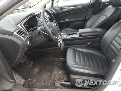 Zdjęcie 7 z 12 samochodu: 2017 FORD FUSION SE HYBRID VIN:3FA6P0LUXHR409192 - miniatura
