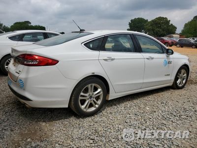 Trzecie zdjęcie samochodu z tyłu: 2018 FORD FUSION SE HYBRID VIN:3FA6P0LU3JR171739 - miniatura