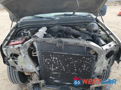 Zdjęcie 12 z 14 samochodu: 2000 FORD EXCURSION XLT VIN:1FMNU40L3YEC37832 - miniatura