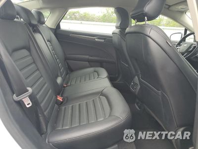 Zdjęcie 10 z 13 samochodu: 2017 FORD FUSION SE HYBRID VIN:3FA6P0LUXHR409452 - miniatura