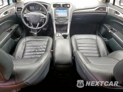 Zdjęcie 8 z 13 samochodu: 2017 FORD FUSION SE HYBRID VIN:3FA6P0LU5HR408984 - miniatura
