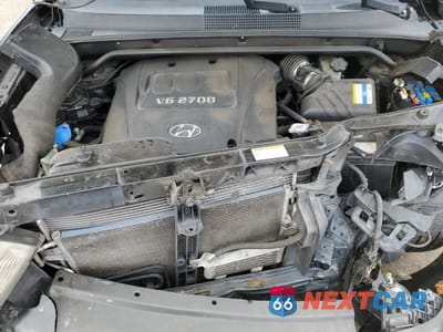 Zdjęcie 12 z 15 samochodu: 2007 HYUNDAI TUCSON SE VIN:KM8JN72D37U574931 - miniatura