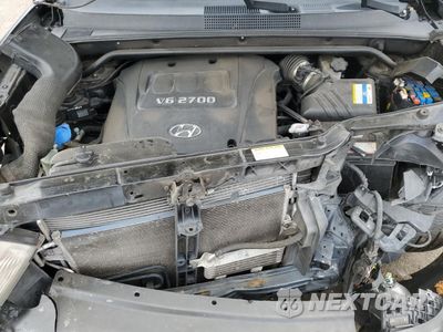 Zdjęcie 12 z 15 samochodu: 2007 HYUNDAI TUCSON SE VIN:KM8JN72D37U574931 - miniatura