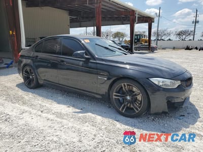 Czwarte zdjęcie samochodu z boku: 2015 BMW M3 VIN:WBS3C9C52FP804079 - miniatura