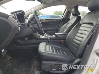 Zdjęcie 7 z 12 samochodu: 2017 FORD FUSION SE HYBRID VIN:3FA6P0LUXHR359670 - miniatura