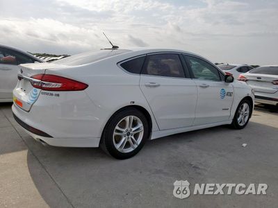 Trzecie zdjęcie samochodu z tyłu: 2018 FORD FUSION SE HYBRID VIN:3FA6P0LU9JR118592 - miniatura