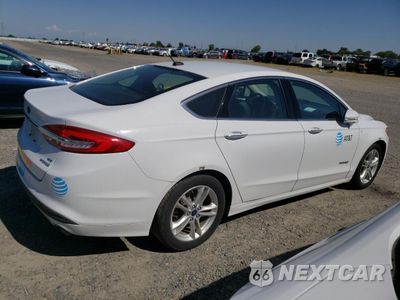 Trzecie zdjęcie samochodu z tyłu: 2018 FORD FUSION SE HYBRID VIN:3FA6P0LU0JR129822 - miniatura