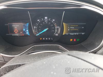 Zdjęcie 9 z 13 samochodu: 2017 FORD FUSION SE HYBRID VIN:3FA6P0LUXHR359636 - miniatura