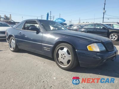Czwarte zdjęcie samochodu z boku: 2000 MERCEDES-BENZ SL 500 VIN:WDBFA68F1YF195276 - miniatura