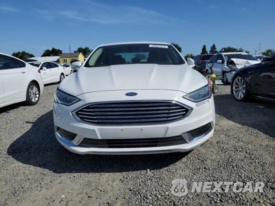 Piąte zdjęcie samochodu w środku: 2018 FORD FUSION SE HYBRID VIN:3FA6P0LU3JR171563 - miniatura