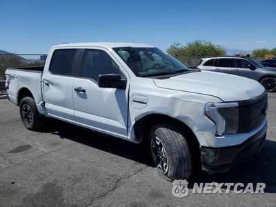 Czwarte zdjęcie samochodu z boku: 2023 FORD F150 LIGHTNING PRO VIN:1FT6W1EV1PWG44293 - miniatura