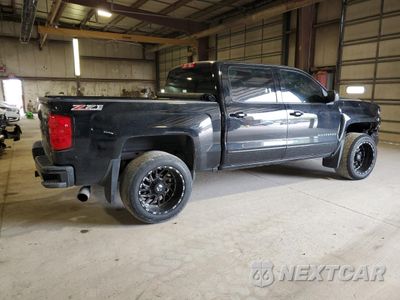 Trzecie zdjęcie samochodu z tyłu: 2016 CHEVROLET SILVERADO K1500 LT VIN:3GCUKREC2GG251711 - miniatura