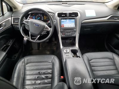 Zdjęcie 8 z 13 samochodu: 2017 FORD FUSION SE HYBRID VIN:3FA6P0LUXHR409404 - miniatura