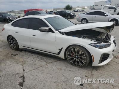 Czwarte zdjęcie samochodu z boku: 2022 BMW M440XI GRAN COUPE VIN:WBA13AW06NFN16633 - miniatura