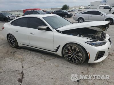 Czwarte zdjęcie samochodu z boku: 2022 BMW M440XI GRAN COUPE VIN:WBA13AW06NFN16633 - miniatura