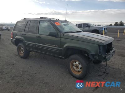 Czwarte zdjęcie samochodu z boku: 1996 JEEP GRAND CHEROKEE LIMITED VIN:1J4GZ78S3TC238067 - miniatura