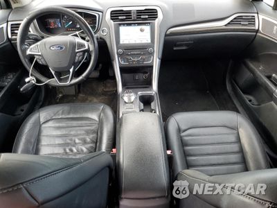 Zdjęcie 8 z 12 samochodu: 2017 FORD FUSION SE HYBRID VIN:3FA6P0LUXHR409242 - miniatura