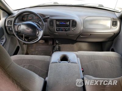 Zdjęcie 8 z 14 samochodu: 1999 FORD F150 VIN:1FTRX18L3XKA97801 - miniatura