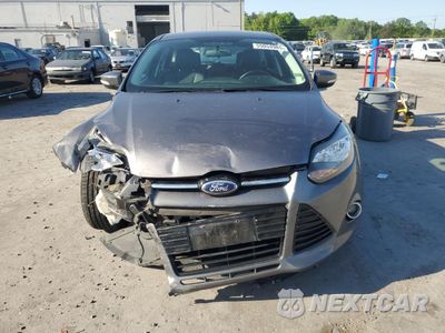 Piąte zdjęcie samochodu w środku: 2014 FORD FOCUS TITANIUM VIN:1FADP3N24EL269008 - miniatura