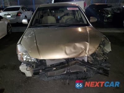 Piąte zdjęcie samochodu w środku: 2010 KIA RIO LX VIN:KNADH4A31A6684272 - miniatura