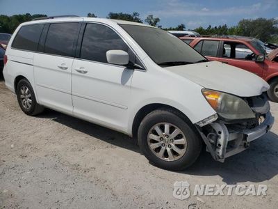 Czwarte zdjęcie samochodu z boku: 2010 HONDA ODYSSEY EXL VIN:5FNRL3H62AB093843 - miniatura
