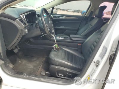 Zdjęcie 7 z 12 samochodu: 2017 FORD FUSION SE HYBRID VIN:3FA6P0LU0HR409556 - miniatura