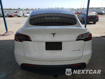 Zdjęcie 6 z 14 samochodu: 2022 TESLA MODEL Y VIN:7SAYGDEE9NF431927 - miniatura