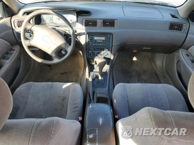 Zdjęcie 8 z 12 samochodu: 1999 TOYOTA CAMRY LE VIN:JT2BG22K4X0303476 - miniatura