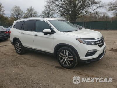 Czwarte zdjęcie samochodu z boku: 2018 HONDA PILOT TOURING VIN:5FNYF6H95JB042464 - miniatura