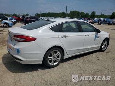 Trzecie zdjęcie samochodu z tyłu: 2018 FORD FUSION SE HYBRID VIN:3FA6P0LU4JR118693 - miniatura