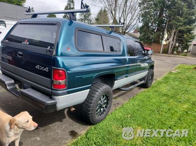 Czwarte zdjęcie samochodu z boku: 1998 DODGE RAM 1500 VIN:3B7HF12ZXWM279398 - miniatura