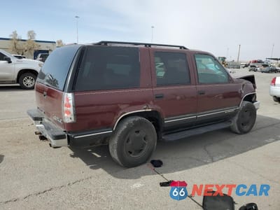 Trzecie zdjęcie samochodu z tyłu: 1999 CHEVROLET TAHOE K1500 VIN:1GNEK13R7XR129141 - miniatura