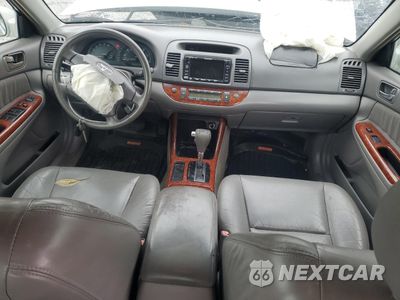 Zdjęcie 8 z 12 samochodu: 2003 TOYOTA CAMRY LE VIN:4T1BF30K53U552094 - miniatura