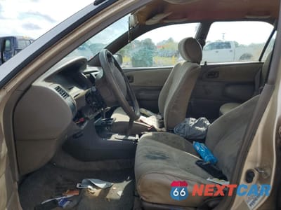 Zdjęcie 7 z 14 samochodu: 1997 TOYOTA COROLLA DX VIN:1NXBA02EXVZ538005 - miniatura