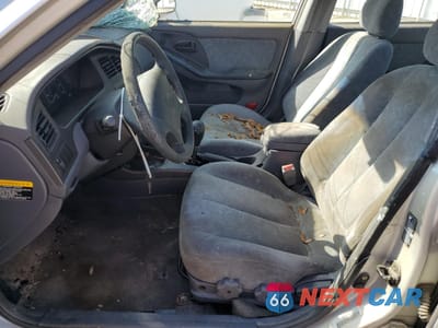 Zdjęcie 7 z 12 samochodu: 2002 HYUNDAI ELANTRA GLS VIN:KMHDN45DX2U280135 - miniatura