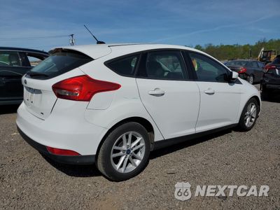 Trzecie zdjęcie samochodu z tyłu: 2018 FORD FOCUS SE VIN:1FADP3K23JL279902 - miniatura