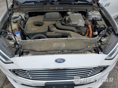 Zdjęcie 11 z 12 samochodu: 2017 FORD FUSION SE HYBRID VIN:3FA6P0LU0HR409640 - miniatura